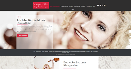 Screenshot der Zsuzsa Debre-Startseite mit dunkelgrauem Menü, Porträt einer lächelnden Frau im Fokus und darunter Produkt- und Service-Teaser.